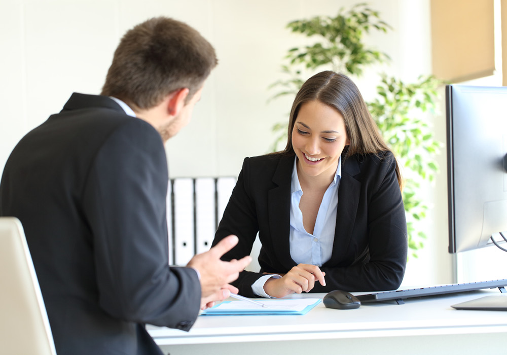 Leasing specialist assisting prospect to rent an Essex apartment