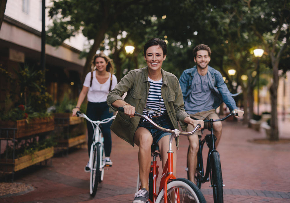Three friends biking through the East Bay.