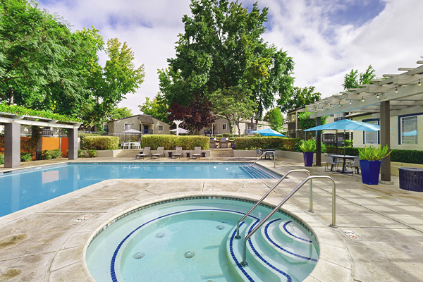 Swimming pool with lounge furniture