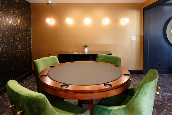 Recreation Room with lounge chairs and table.