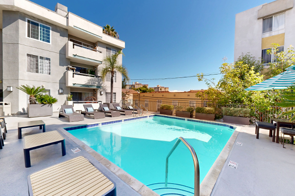 Swimming pool with lounge furniture.