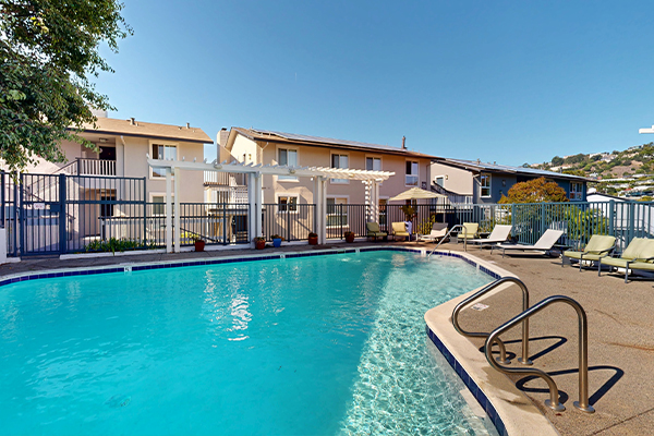 Swimming pool with lounge furniture.